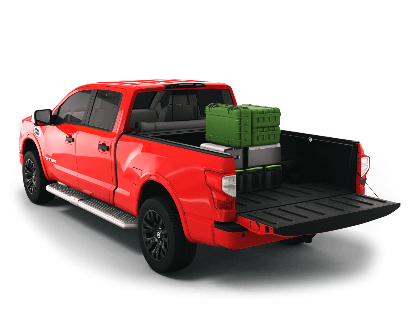 Red Nissan Titan with gear in the truck bed and the Sawtooth Stretch tonneau cover rolled up at cab 